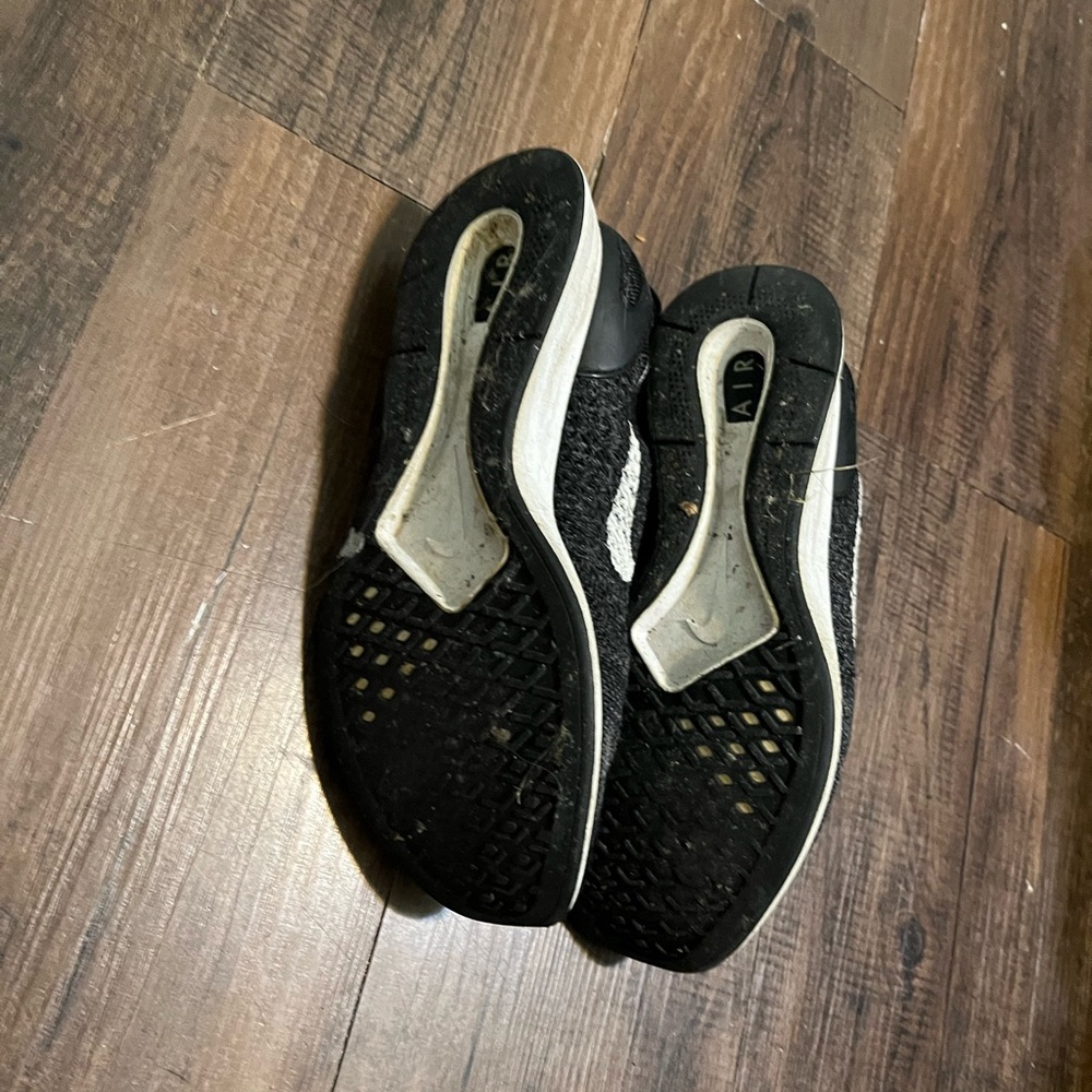 Nike Air black and white tennis shoes.